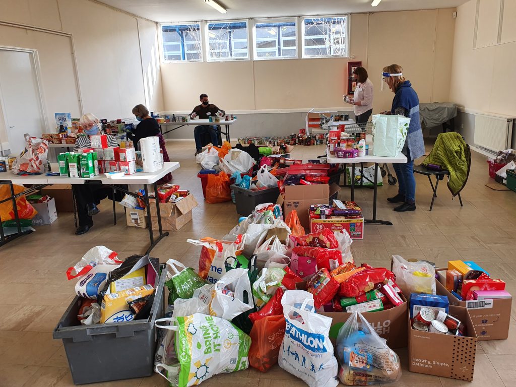 The team hard at work sorting Christmas donations 2020