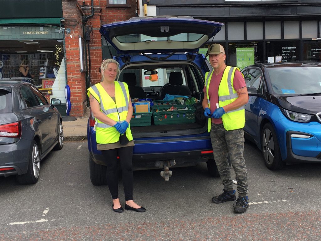 Mike and Collette delivering donations during Covid-19