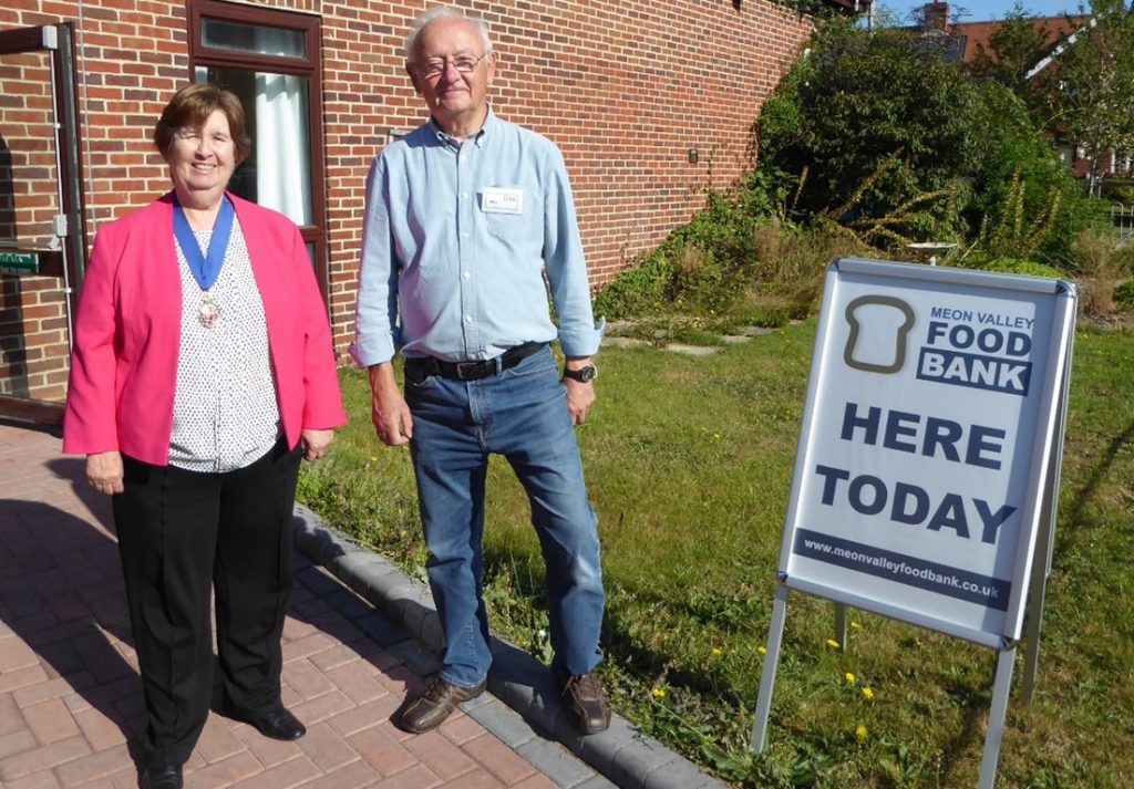 Vivian Achwal, visiting as Mayor of Winchester, being welcomed by Mike Salter, Chairman of the Food Bank Trustees