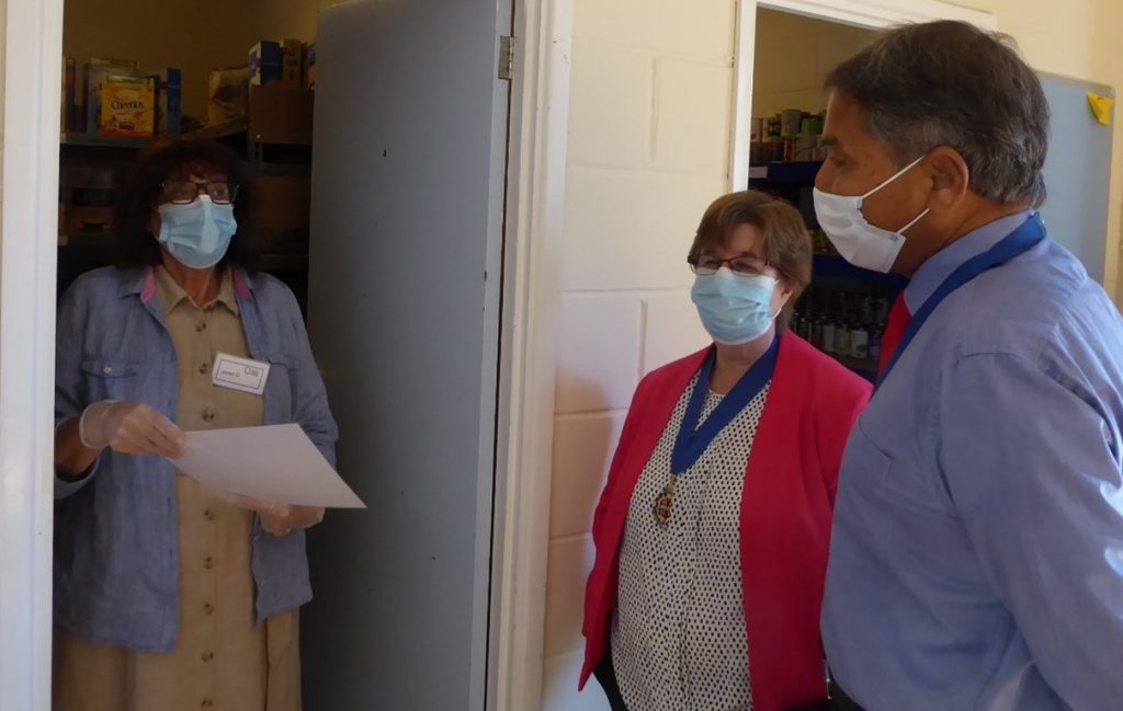 Janet Dunsford, one of our long-serving Volunteers, explaining how we make up our food parcels.