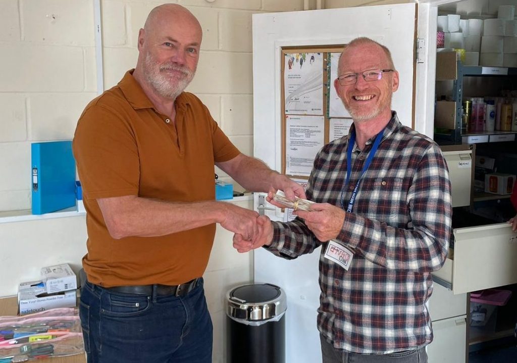 The Square Cow delivering to the food bank.