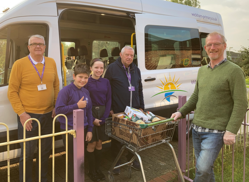 Gifts from the pupils and parents of Wickham CofE Primary School being delivered